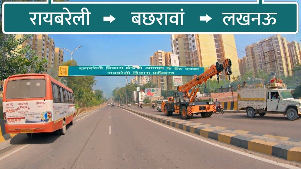 Best-Residential-Area-in-Lucknow-raebareli-highway-with-signage-broad-bus-and-crane